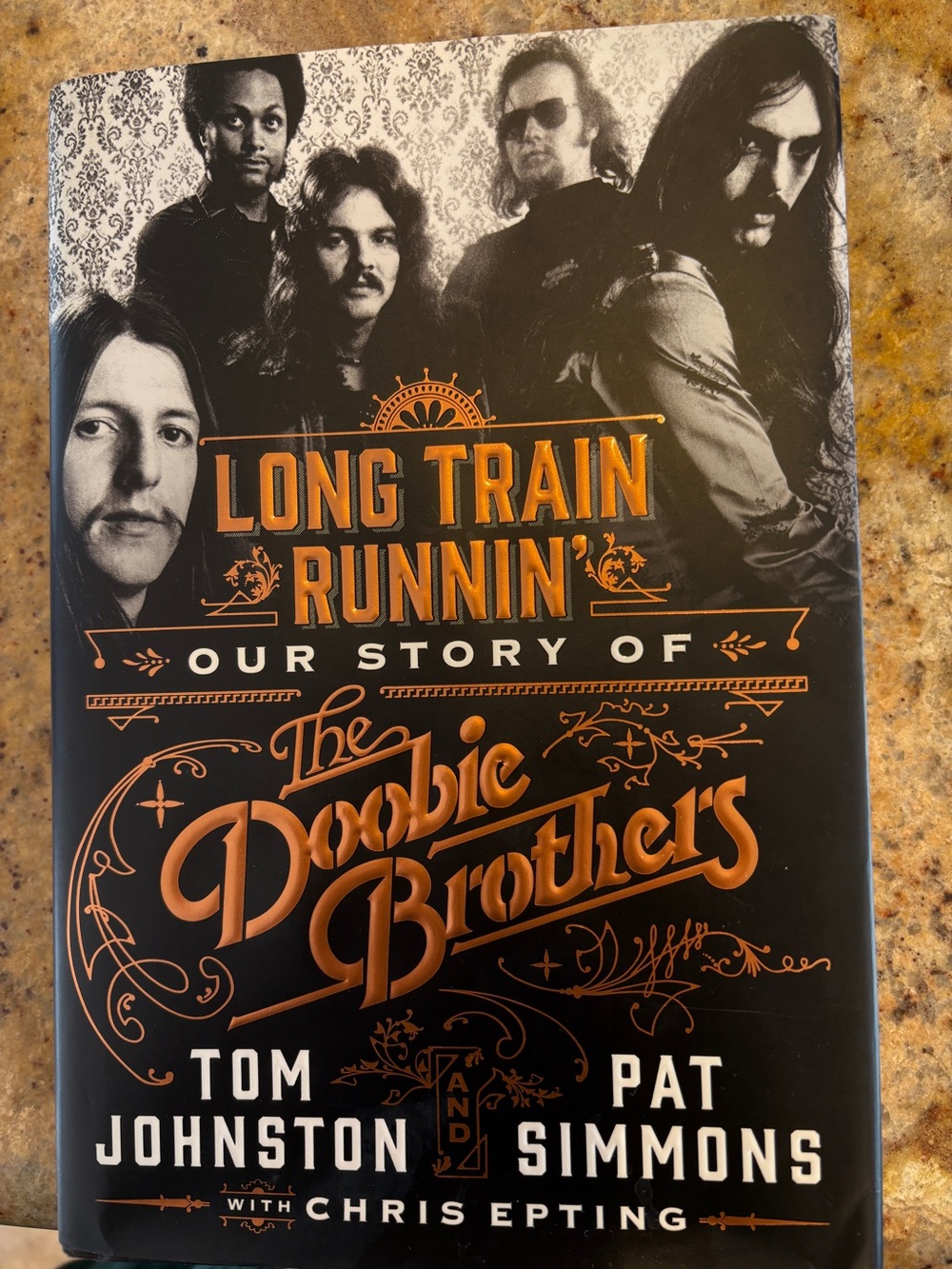 Long Train Runnin' - The Doobie Brothers Hardcover Book (Black & Orange)